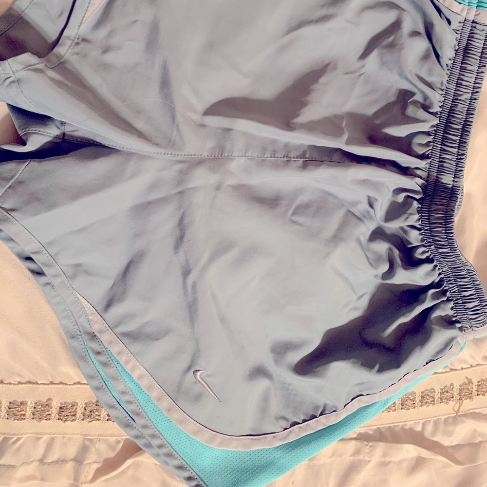 Nike shorts. Grey and teal. Size Small.